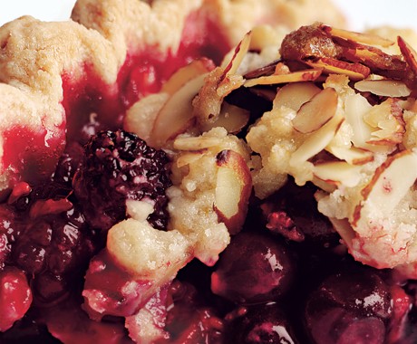 Mixed berry pie with ginger, orange, and almond streusel