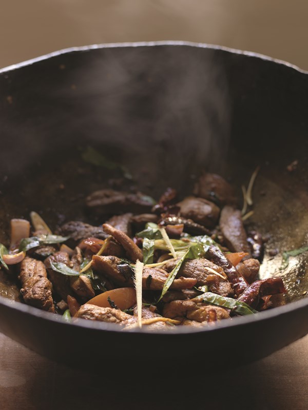 Mixed game cooked in an Indian wok (Kadhai ka shikar)