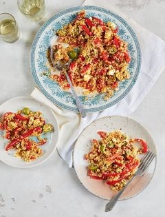 Mixed grain salad with roasted peppers and harissa dressing