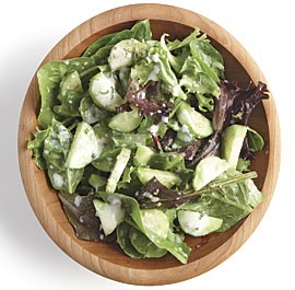 Mixed greens with cucumber, sesame seeds, and ginger-yogurt dressing