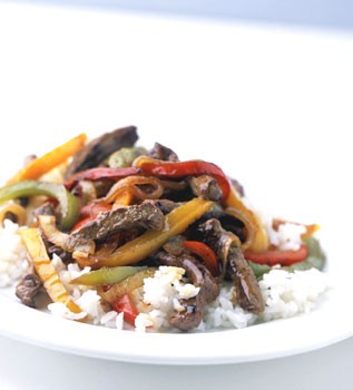 Mixed-pepper steak with onions