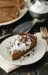 Molasses-hazelnut chocolate mousse tart with coconut whipped cream