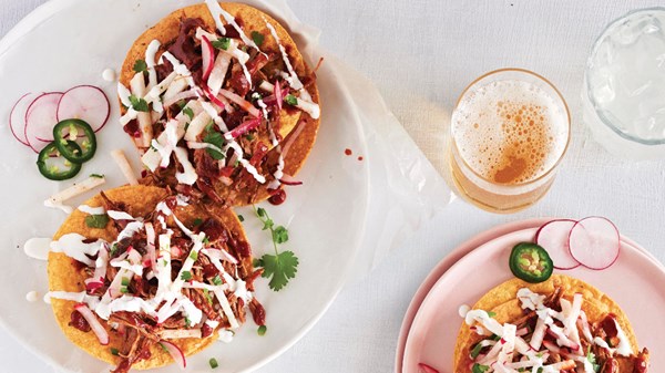 Mole pork tostadas with Mexican crema and jícama relish