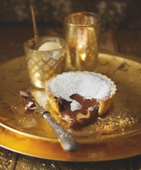 Molten chocolate and salted peanut butter mousse tarts with peanut ice cream