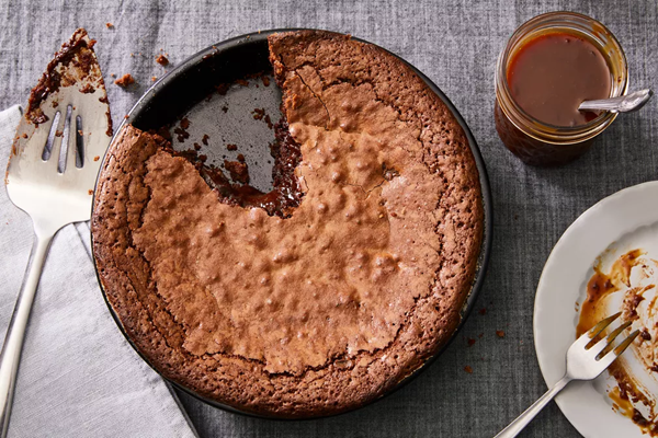 Molten dark chocolate & black olive cake with caramel sauce