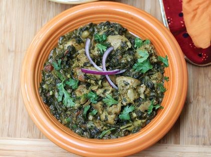 Mom's chicken curry with seasonal greens (Saag murgh)