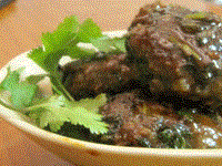 Mongolian fried lamb burgers with cilantro (Hushuur)