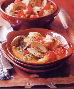 Monkfish and clams with a burned garlic sauce