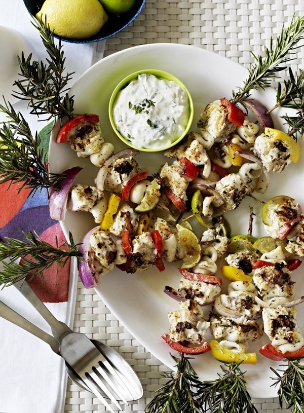 Monkfish and squid souvlaki with herb dressing