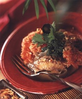 Monkfish coconut curry on red rice with green sauce