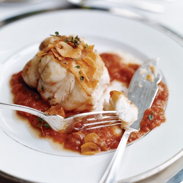 Monkfish in tomato-garlic sauce