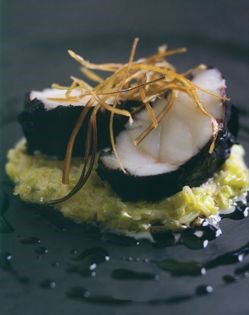 Monkfish poached in spiced red wine with creamed leeks