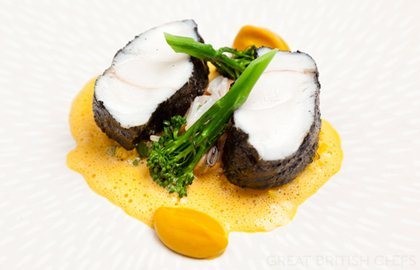 Monkfish tail with blackened spices, cracked wheat and lightly spiced mussels