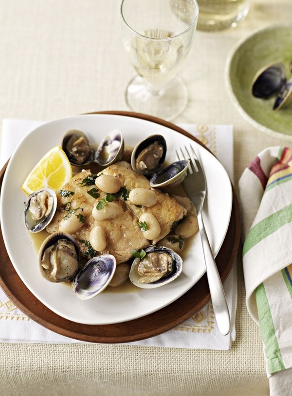 Monkfish with clams, sherry and white beans