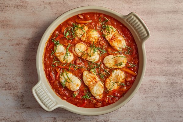 Monkfish with peppers, tomatoes and beans