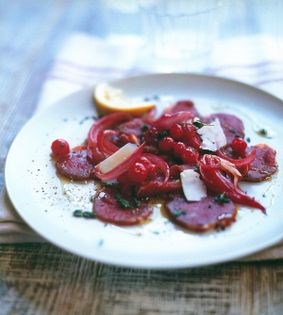 Moose carpaccio with cheese and lingonberry compôte
