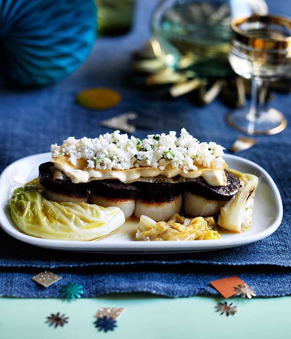 Morcilla and scallops with braised cabbage, tahini sandwich and pickled cauliflower