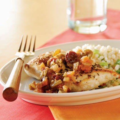 Moroccan chicken with fruit and olive topping