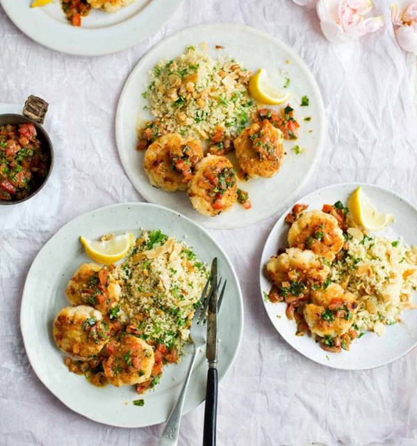 Moroccan fishcakes with tomato chermoula sauce and nutty couscous