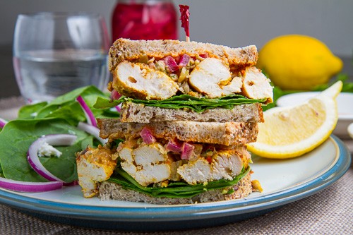 Moroccan grilled chicken sandwich with preserved lemon tapenade and harissa mayo