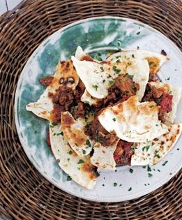 Moroccan lamb tagine with melting tomatoes and onions