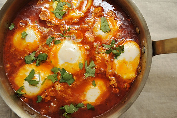 Moroccan merguez ragout with poached eggs