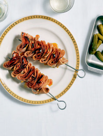 Mortadella skewers with pine syrup