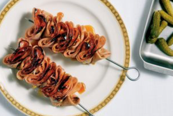 Mortadella skewers with pine syrup