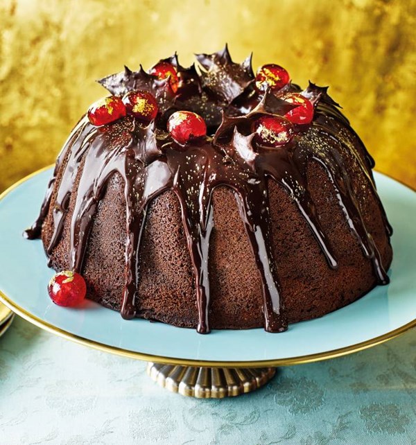 Mulled wine bundt cake with chocolate holly and gilded cherries