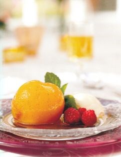 Muscat and vanilla poached peaches with clotted cream