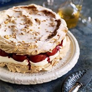 Muscovado and hazelnut meringue cake with mulled wine-spiced pears