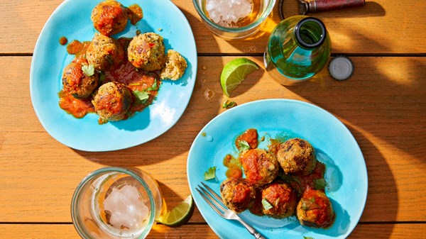 Mushroom albondigas in guajillo tomato sauce with spinach