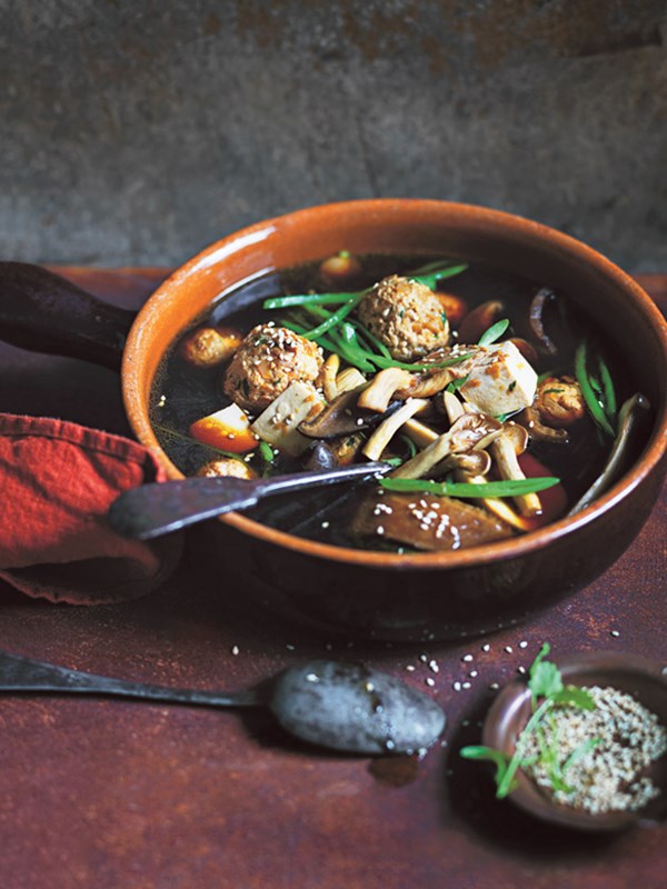 Mushroom and ginger soup with turkey dumplings and greens