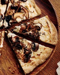 Mushroom-and-goat cheese béchamel pizzas
