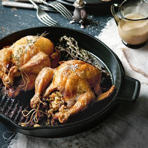 Mushroom and thyme-stuffed poussins with Madeira sauce
