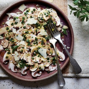 Mushroom carpaccio with gremolata and shaved Parmigiano