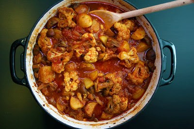 Mushroom, cauliflower and potato jalfrezi with homemade naan