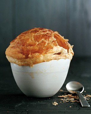 Mushroom consommé with morels and pastry "hats"