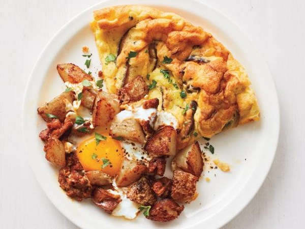Mushroom Dutch baby with chorizo potatoes