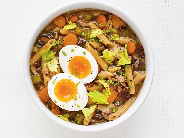 Mushroom noodle soup with soft-boiled eggs