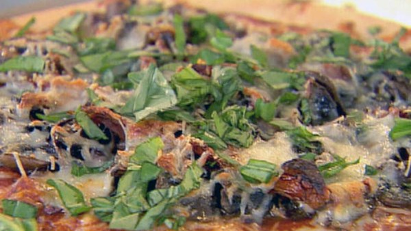 Mushroom, onion, and basil pizza