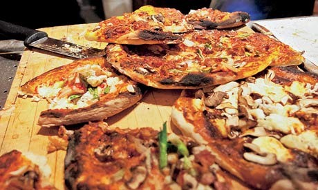 Mushroom, onion, and scallion pizza