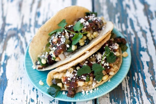 Mushroom, rajas, and corn taco with queso fresco