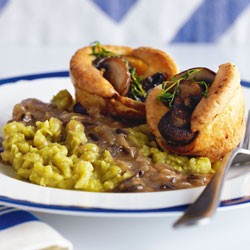 Mushroom toad in the hole with mushy peas and barley gravy