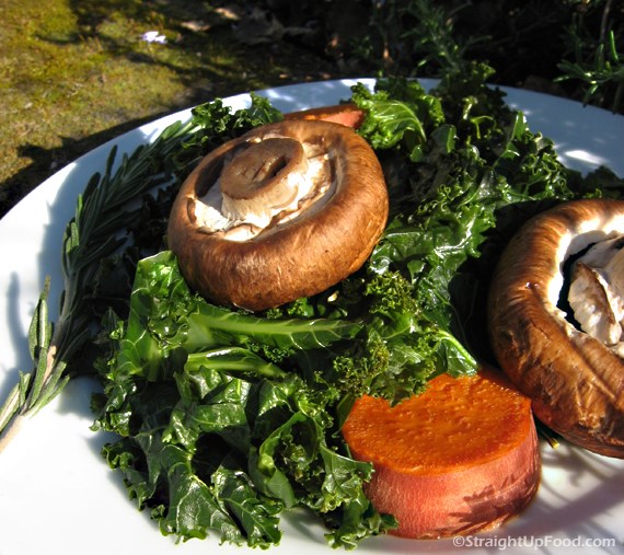 Mushrooms and kale with fresh rosemary