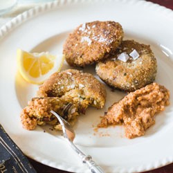 Mussel, chorizo and kumara fritters with paprika and hazelnut romesco
