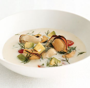 Mussel soup with avocado, tomato, and dill