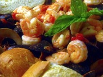 Mussels, clams, and shrimp in spicy tomato broth