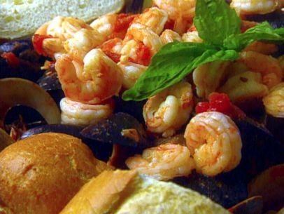 Mussels, clams, and shrimp in spicy tomato broth