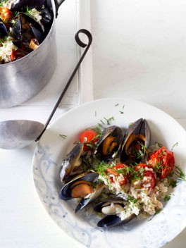 Mussels cooked in a tomato and rice pilaf with dill